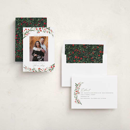 This is a poinsettia babys first christmas with standard by Erin L. Wilson called aurelia printing on recycled smooth signature in standard