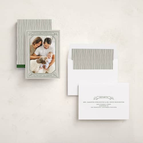 This is a evergreen babys first christmas with standard by Inkblot Design called scroll printing on recycled smooth signature in standard