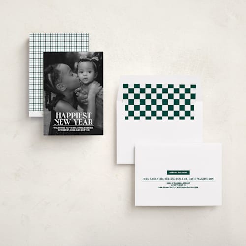 This is a snowfall babys first christmas with standard by Jenna Holcomb called news printing on recycled smooth signature in standard