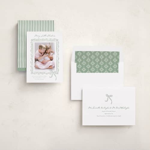 This is a evergreen babys first christmas with standard by Erin German called merry little christmas printing on recycled smooth signature in standard