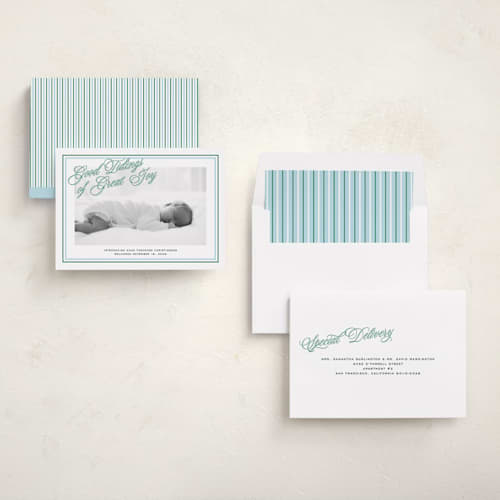 This is a powder babys first christmas with standard by Jenna Holcomb called joyous classic printing on recycled smooth signature in standard