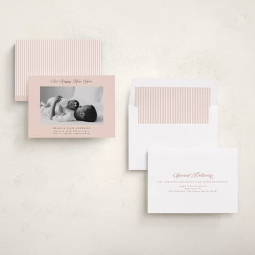 This is a cotton candy babys first christmas with standard by Jennifer Holbrook called our happy new year printing on recycled smooth signature in standard