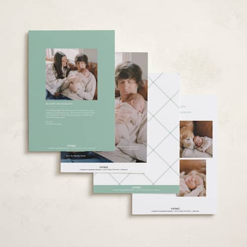 This is a mint babys first christmas with standard by Everett Paper Goods called extra cheer here printing on recycled smooth signature in grand