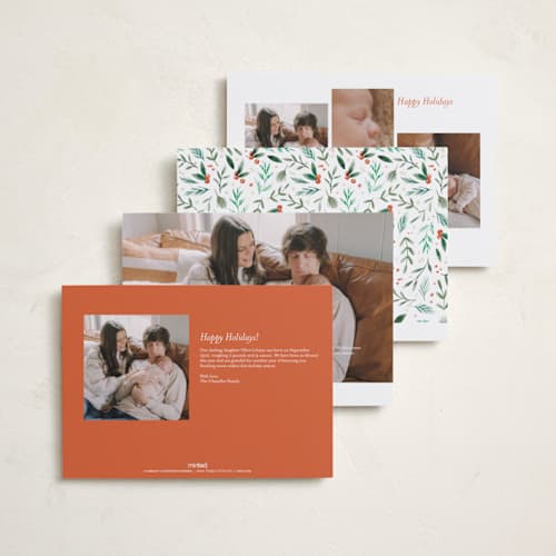 This is a tangerine babys first christmas with standard by Alethea and Ruth called merry little christmas greenery printing on recycled smooth signature in grand
