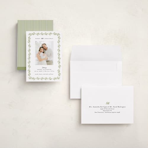This is a mistletoe babys first christmas with standard by Julie Murray called little christmas printing on recycled smooth signature in grand