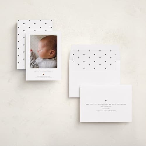 This is a charcoal foil stamped birth announcements with foil pressed by Blustery August called heart printing on recycled smooth signature in standard
