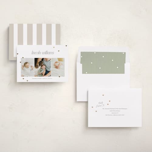 This is a linen foil stamped birth announcements with foil pressed by Robert and Stella called lots of love printing on recycled smooth signature in standard