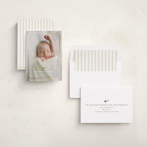 This is a snow foil stamped birth announcements with foil pressed by Creo Study called bevelled printing on recycled smooth signature in standard