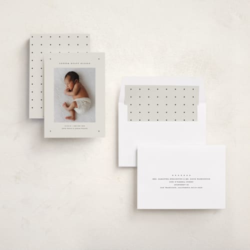 This is a ink foil stamped birth announcements with foil pressed by Kelly Watkins called mini dot printing on recycled smooth signature in standard