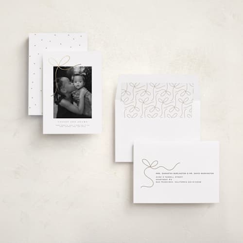 This is a sugar foil stamped birth announcements with foil pressed by Yuliya Evseeva called little bow printing on recycled smooth signature in standard