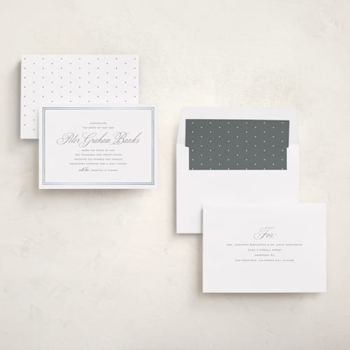 This is a cement foil stamped birth announcements with foil pressed by Megan Davis called scholarly charm printing on signature in standard