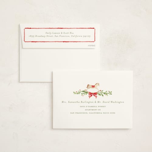 This is a holly baby shower invitations with standard by Sarah Knight called a very merry baby shower printing on signature in standard