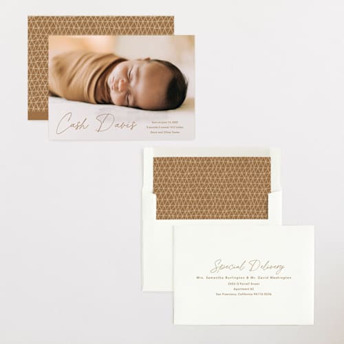This is a rust birth announcements with standard by Stacey Meacham called swaddle printing on recycled smooth signature in standard