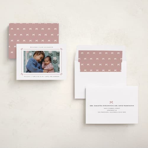 This is a mauve birth announcements with standard by Erica Krystek called bow frame printing on recycled smooth signature in standard