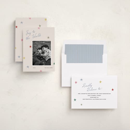 This is a confetti photo christmas cards with standard by Pixel and Hank called joy stars printing on recycled smooth signature in standard