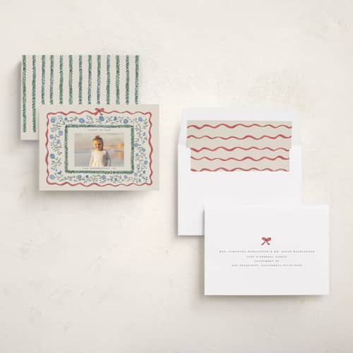 This is a halo photo christmas cards with standard by Teju Reval called floral border printing on recycled smooth signature in standard