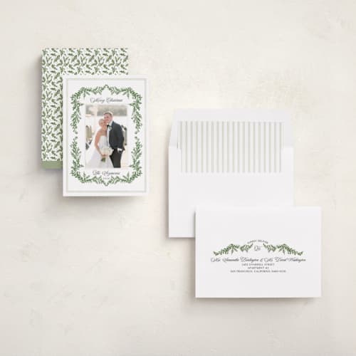This is a pine photo christmas cards with standard by Susan Moyal called framed in holly printing on recycled smooth signature in standard