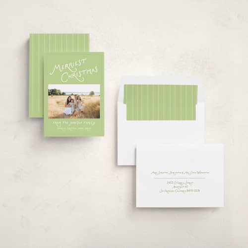 This is a mistletoe photo christmas cards with standard by Lauren Jopling called dotted border printing on recycled smooth signature in standard