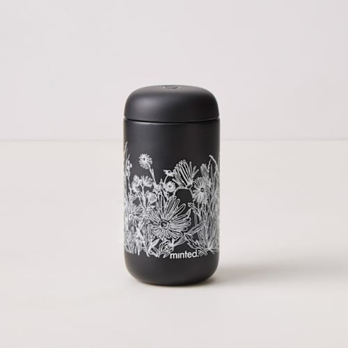 This is a matte black new by Catilustre called field of wildflowers in standard