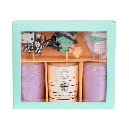 This is a purple party decorations by Jollity and Co called meowloween cupcake decorating set in standard