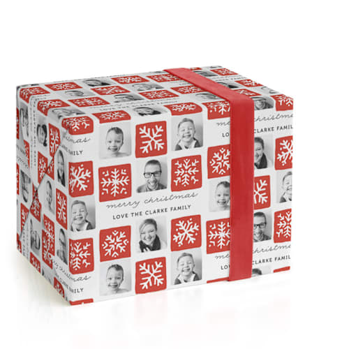 This is a crimson wrapping paper with standard by Kelly Nasuta called snowflake squares printing on wrapping paper in standard