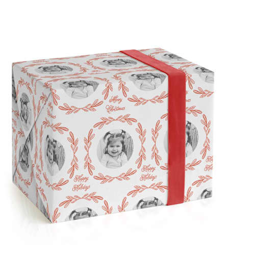 This is a holly wrapping paper with standard by Mansi Verma called ornate frame printing on wrapping paper in standard