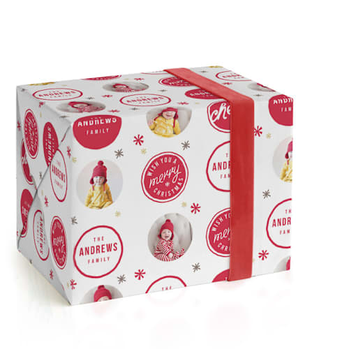 This is a berry wrapping paper with standard by Lori Wemple called a merry christmas printing on wrapping paper in standard
