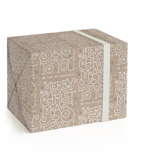 This is a kraft wrapping paper with standard by Jennifer Wick called merry lettering printing on wrapping paper in standard