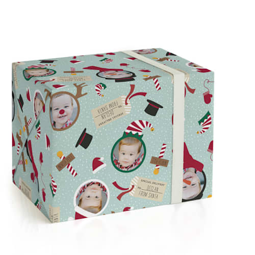 This is a frost wrapping paper with standard by Sarah Brown called santa's wrap printing on wrapping paper in standard
