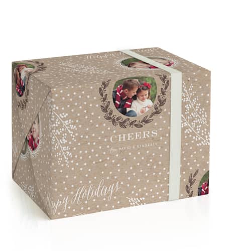 This is a kraft wrapping paper with standard by Sarah Curry called snowy branches printing on wrapping paper in standard