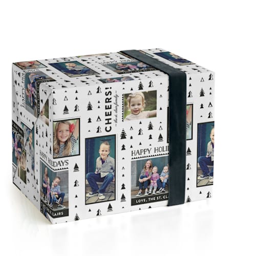 This is a jet wrapping paper with standard by Abby Munn called happy holiday trees printing on wrapping paper in standard