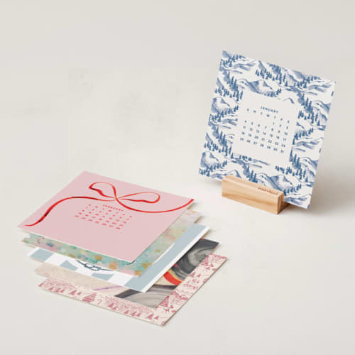 This is a festive photo calendars by Multiple Artists called year of art: 2026 minted desk calendar in standard