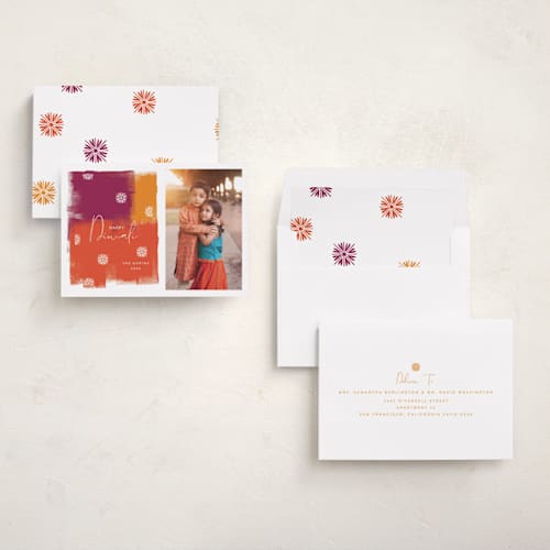 This is a saffron diwali cards with standard by Nazia Hyder called diwali splash printing on recycled smooth signature in standard