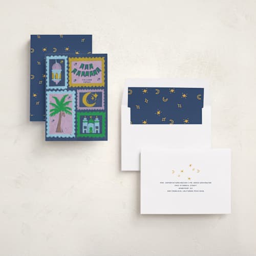 This is a navy eid cards with standard by Erum Khalili Art called eid joy - lanterns, moon & mosque printing on signature in standard