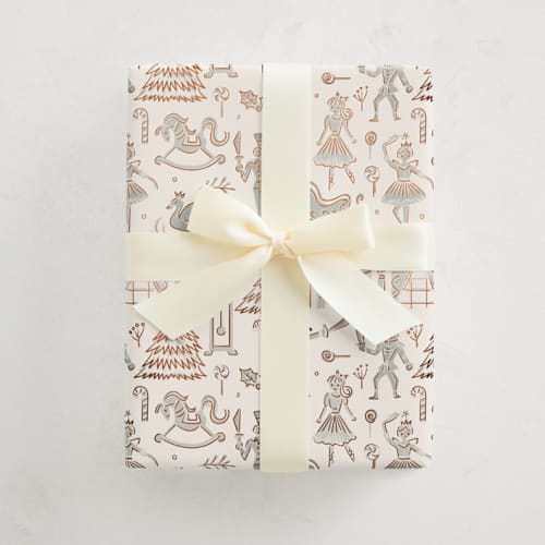 This is a tinsel wrapping paper by Teju Reval called linocut nutcracker in standard