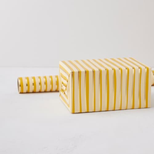 This is a sunshine wrapping paper by Pippa Shaw called ribbon stripe in standard