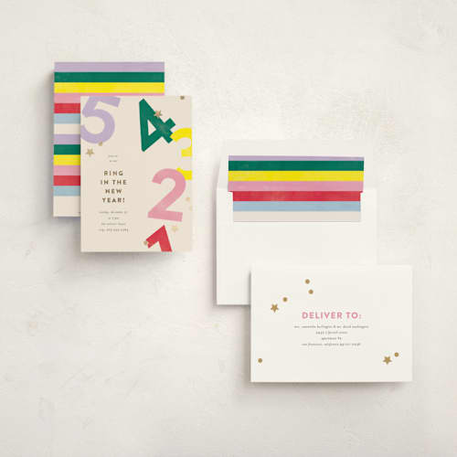 This is a punch holiday party invitations with foil pressed by Pixel and Hank called ring in the new year printing on signature in standard