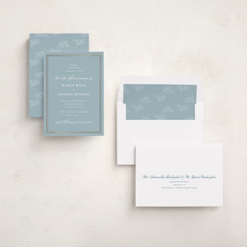 This is a powder blue holiday party invitations with foil pressed by Jennifer Postorino called polished printing on signature in standard