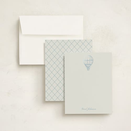 This is a ivory foil stamped stationery with foil pressed by Cass Loh called timeless voyage printing on signature in 4.25x5.5