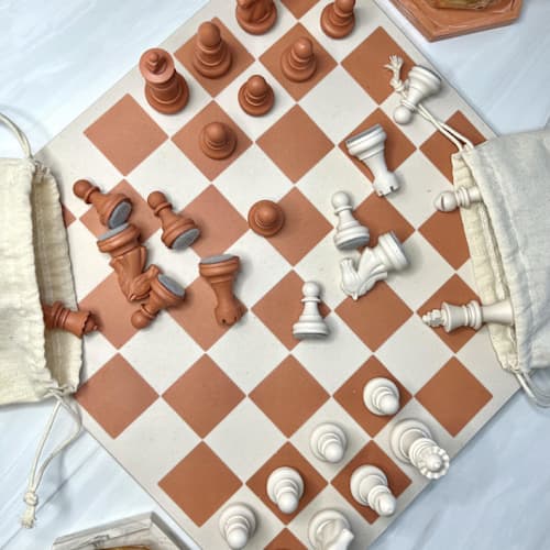 This is a multicolorassorted-colors home decor by Swift and Stone called terracotta chess board set in standard