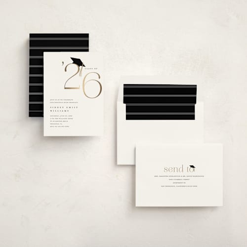 This is a cotton graduation invitations with foil pressed by Stacey Meacham called cap and year printing on signature in standard