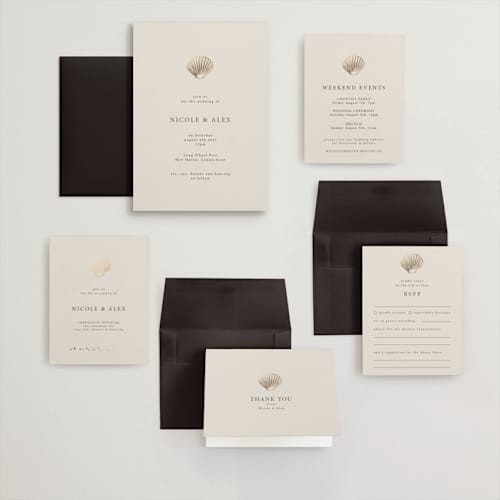 This is a sand wedding invitations with foil pressed by Hannah Bowman called simple seashell printing on signature in grand