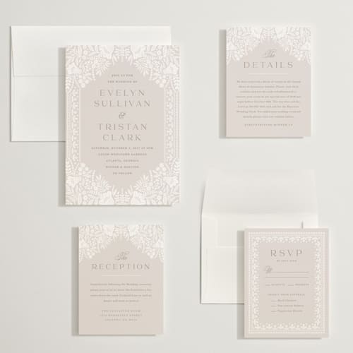 This is a cream wedding invitations with standard by Kristen Smith called lace trim printing on signature in grand