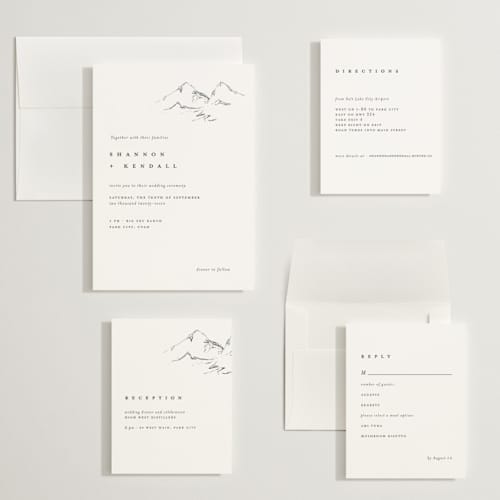 This is a snow wedding invitations with standard by Mere Paper called sketched mountains printing on signature in grand