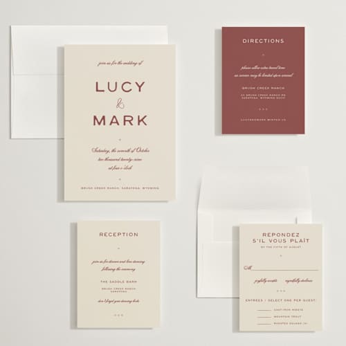 This is a rust wedding invitations with standard by Ani Somi called rose ink printing on signature in grand