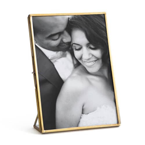 This is a gold place card holders by Minted called brass in standard
