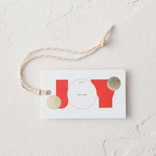 This is a poinsettia gift tags by lori jacobs wemple called bold joy in standard