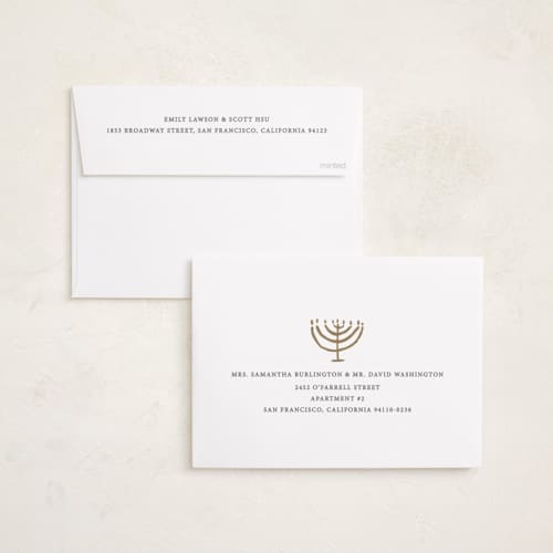 This is a gilded hanukkah cards with foil pressed by Sumak Studio called golden menorah printing on recycled smooth signature in standard