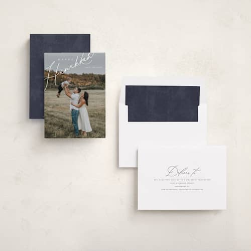 This is a snow hanukkah cards with standard by Laura Bercovich called hanukkah scrawl printing on recycled smooth signature in standard