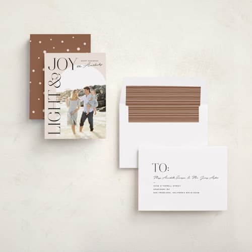 This is a creme hanukkah cards with standard by Annie Clark called jubilant arch printing on recycled smooth signature in standard